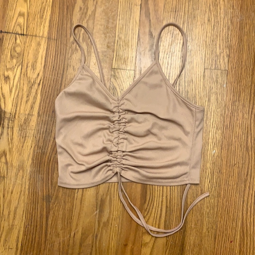 Hi! I am selling a pale/pink/cream crop top.
